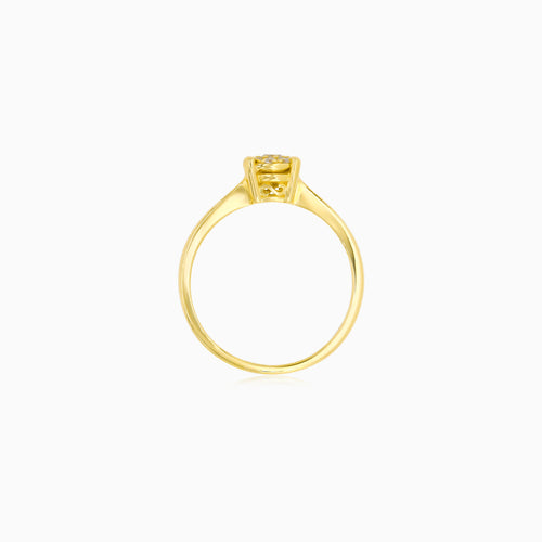 Elegantní halo prsten ze žlutého zlata s diamanty