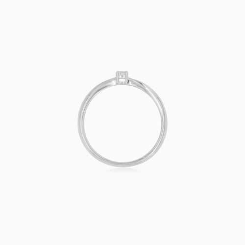 Petite solitaire engagement ring