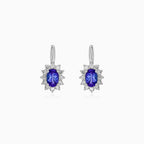 White gold tanzanite and diamond halo earrings