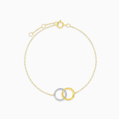 Gold bracelet with interlocking circles and diamonds