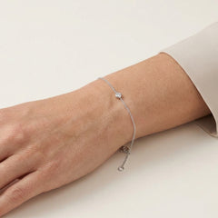 White gold bracelet with a bezel-set diamond