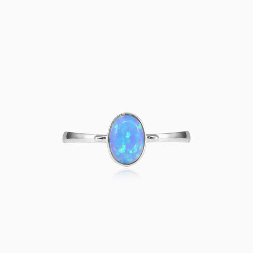 Anillo solitario sencillo de ópalo azul