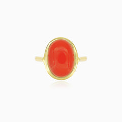 Elegant yellow gold coral cabochon ring