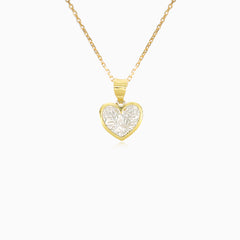 Péndulo de corazón en oro amarillo y blanco