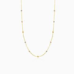 Goldene Halskette mit zehn goldenen Kugeln