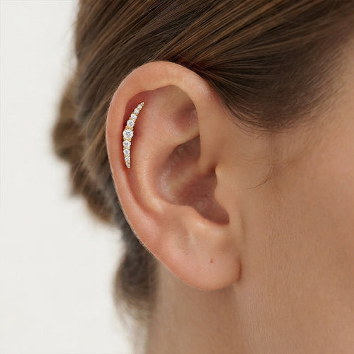 Yellow Gold Graduated Zirconia Ear Piercing