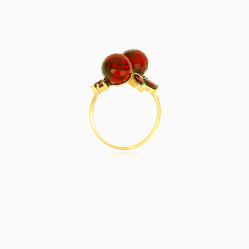 Interessant gestalteter Gelbgold-Granat-Ring