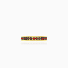 Yellow gold ring with eternity garnets in bezel set