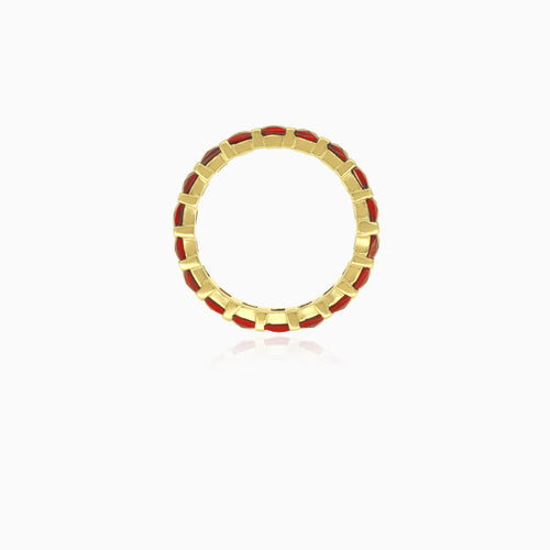 Yellow gold ring with eternity princess cut garnets