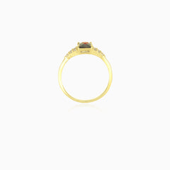 Elegant emerald cut garnet ring with cubic zirconia