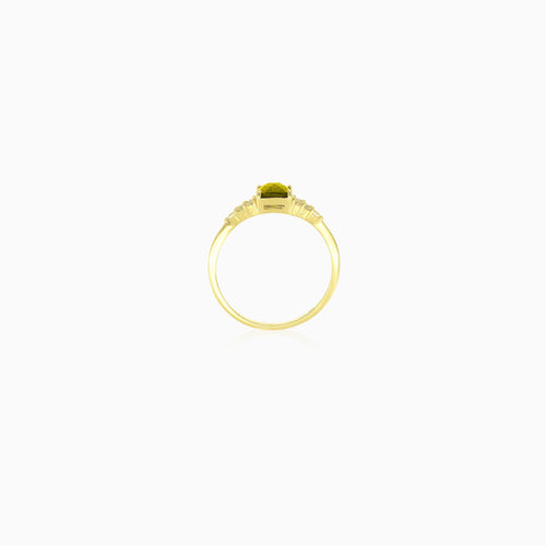 Stylish emerald cut moldavite ring with cubic zirconia
