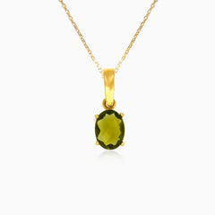 Pendentif en or jaune avec pierre de moldavite taillée en ovale