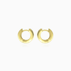 Stylish yellow gold hoop earrings with garnets
