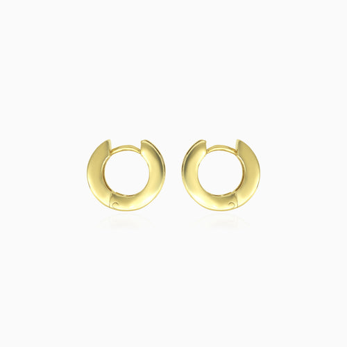 Stylish yellow gold hoop earrings with garnets