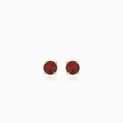 Yellow gold stud earrings with round garnet