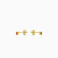 Classic round cut garnet studs with three prong set