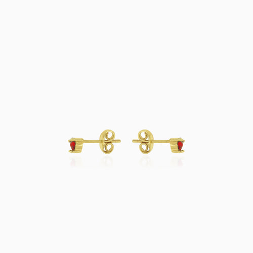 Classic round cut garnet studs with three prong set