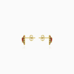 Floral garnet gold stud earrings