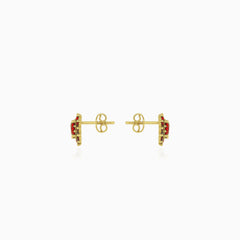 Pendientes de oro con granate floral