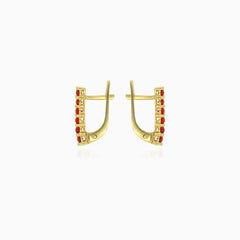 Classic garnet drop earrings in yellow gold