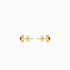 Royal garnet and cubic zirconia gold stud earrings