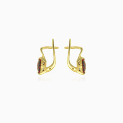 Round cut garnet solitaire yellow gold earrings