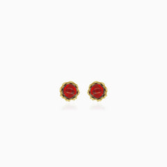Garnet yellow gold earrings with crown details
