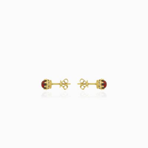 Pendientes de granate en oro amarillo con detalles de corona