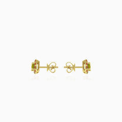 Eternal Radiance stud earrings in gold with  moldavite and garnet