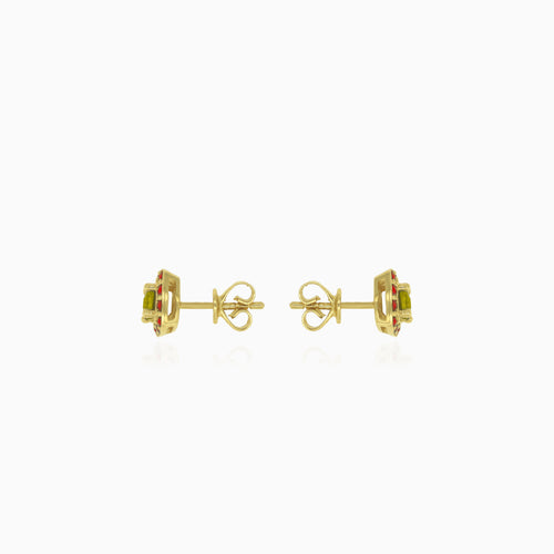 Eternal Radiance stud earrings in gold with  moldavite and garnet