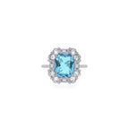 Halo-Ring mit kissenförmigem Blautopas