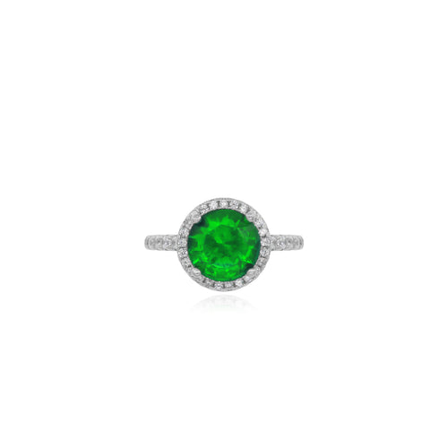 Halo-Ring mit funkelndem Smaragd