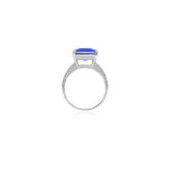 Sterling silver ring with emerald step cut sapphire