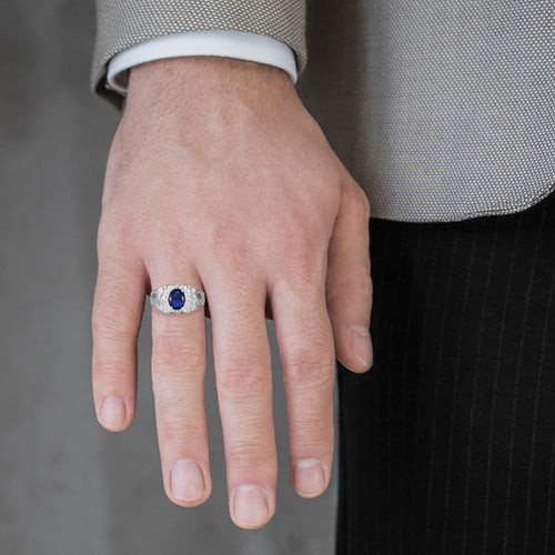 Silver halo ring with sapphire center
