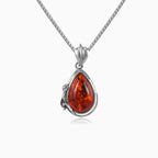 Sterling silver pendant with amber
