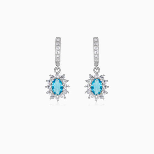 Halo-Silber-Hängerohrringe mit Blau-Topas