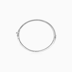 Sterling silver bangle with sapphire accents