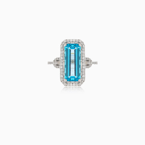 Elegant blue topaz baguette ring in white gold
