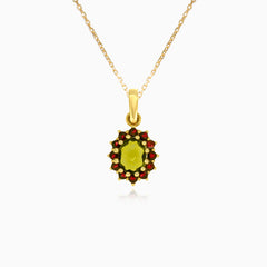 Royal Radiance in yellow gold with moldavite oval cut and garnet round stone