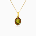 Royal Radiance en oro amarillo con piedras de moldavita y granate