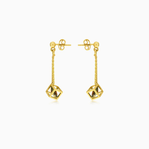 Goldene Glow-Granatwürfel-Tropfen