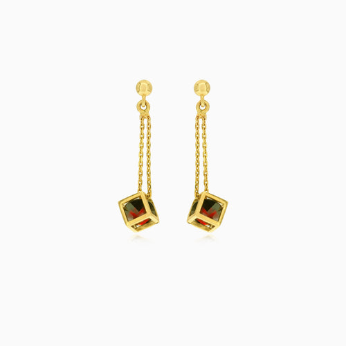 Goldene Glow-Granatwürfel-Tropfen