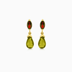 Elegantes pendientes colgantes de moldavita y granate