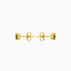 Elegant moldavite and gold stud earrings
