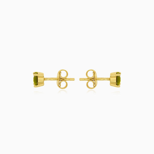 Elegant moldavite and gold stud earrings