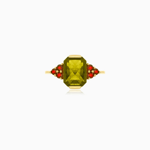 Ring mit strahlender Ausstrahlung aus Moldavit und Granat