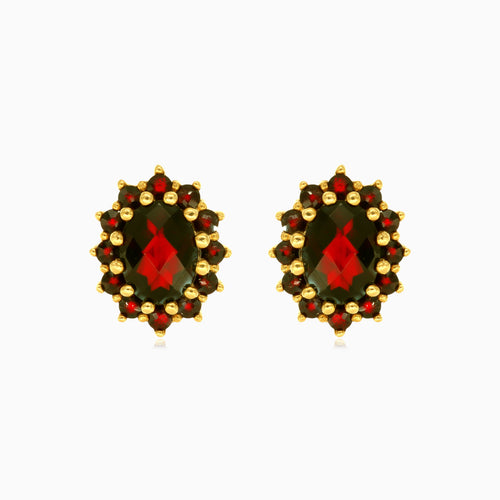 Pendientes colgantes de oro con elegancia floral.