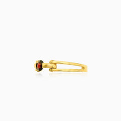 Eleganter Goldring mit rundem Granat