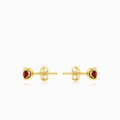Round garnet gold studs