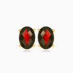 Garnet oval stud earrings in 14kt yellow gold